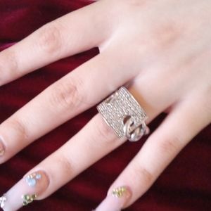 .925 sterling silver half chain link ring with front encrusted in CZ's size 7.